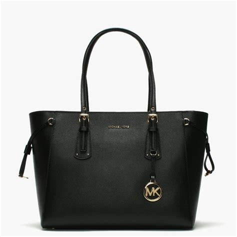 michael kors tzlgnstote black|Michael Kors tote bag.